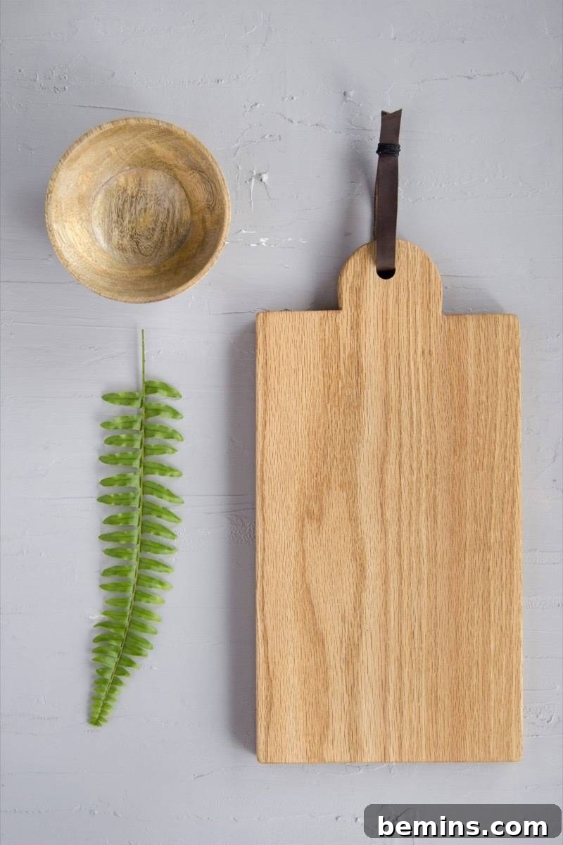 Craft a Custom Cutting Board: A Quick DIY Project 12 Wood cutting board used as a serving tray