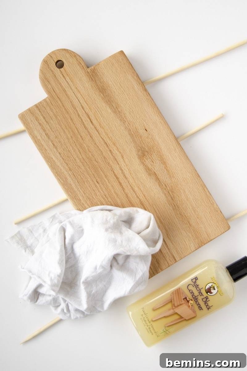 Craft a Custom Cutting Board: A Quick DIY Project 9 Applying butcher block conditioner to the cutting board