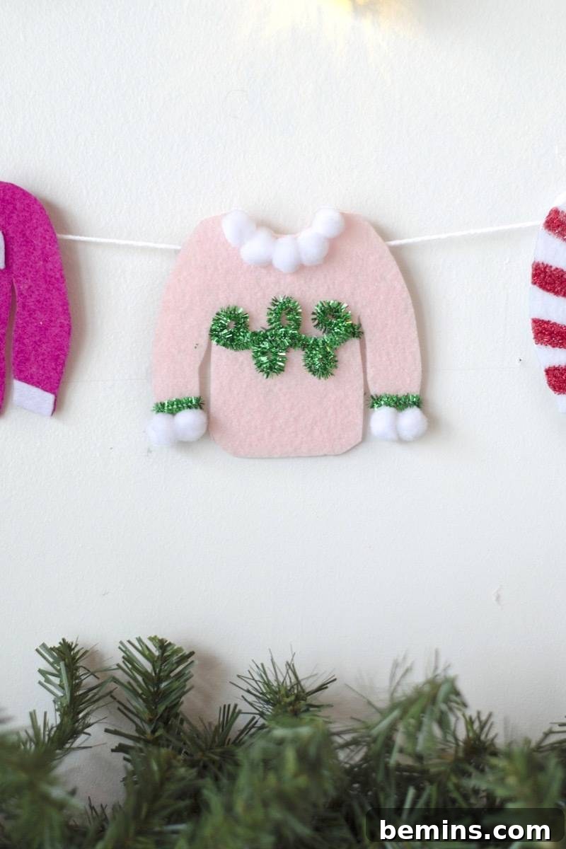 Detail shot of tacky Christmas sweater garland project
