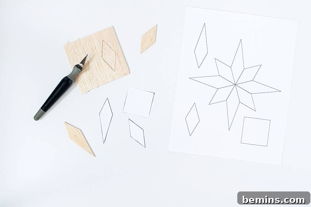 A person drawing shapes on a white paper.