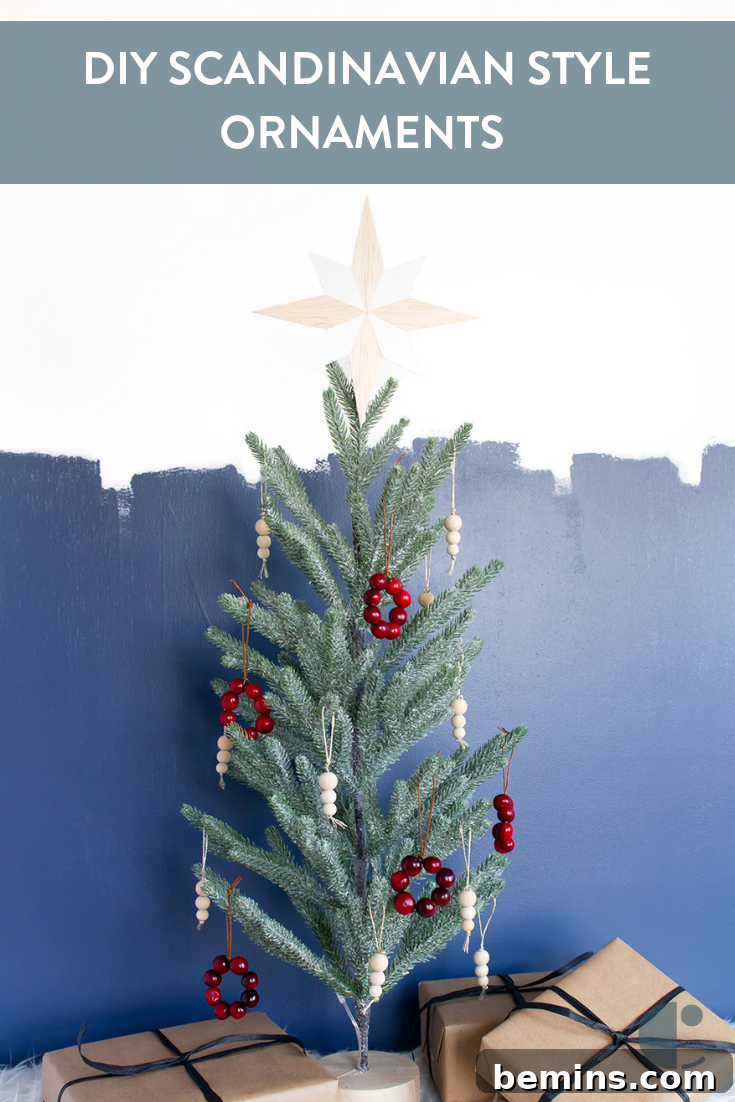 Small Christmas tree with circular red beaded ornaments.