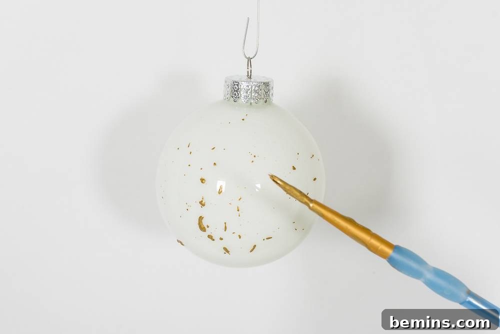 Gold splatter-painted ornaments
