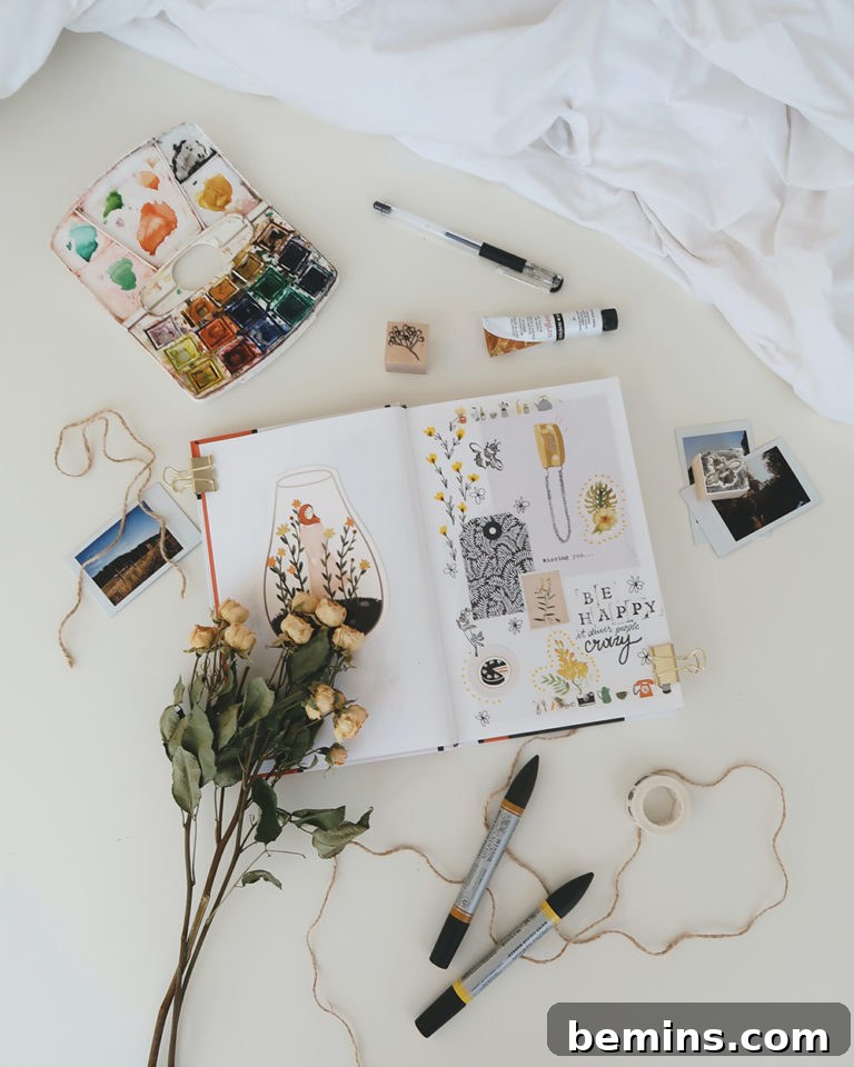 Notebook with sketches and paints, symbolizing the belief in one's creativity