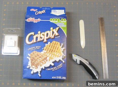 Image showcasing the necessary materials for creating a DIY gift box, including a cereal box, ruler, cutting tools, and adhesive.