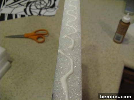 Creating Dimensional Wall Decor from Foam 5 Add glue to the edge of the panel