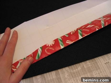 A Christmas gift wrapped with decorative paper.