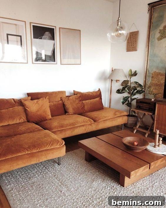 three pieces hanging above the couch. 