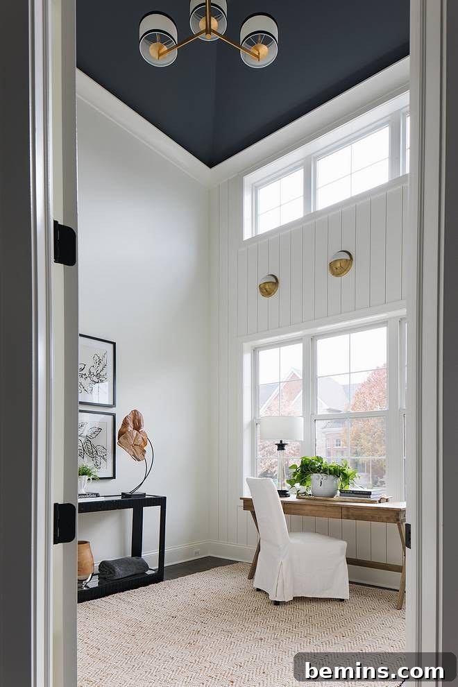 Room with high ceilings and well placed artwork from Home Bunch.