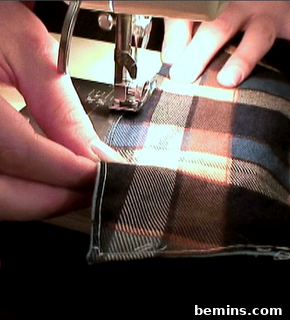 Sewing a corset from plaid.