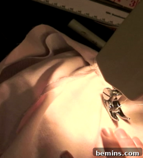 Sewing the elastic casing.