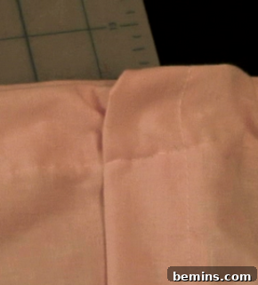 Measuring and stitching the elastic casing.