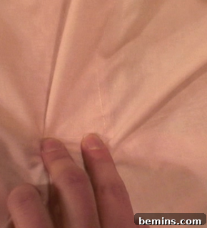 Securing the front flap of the boxers.