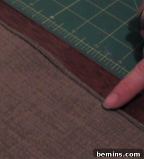 Creating pleats in the fabric.