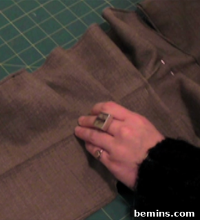 Attaching the elastic to the fabric.