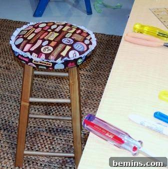 Finished bar stool with the new fabric cover