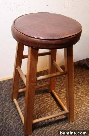 Refurbishing Round Bar Stools: A DIY Upholstery Guide 3 Bar stool before reupholstering, showing the original fabric
