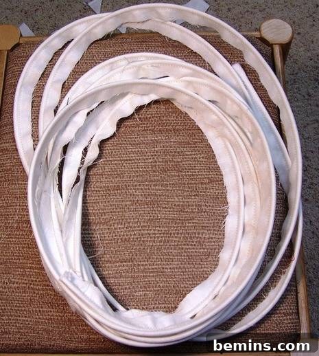 Finished fabric-covered welt cord neatly coiled and ready for use in sewing projects