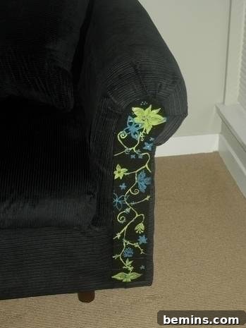 DIY Couch Makeover: An Upholstery Guide for Beginners 5 Close-up of the painted arm panel on the reupholstered couch