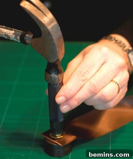 Using the grommet setting tool