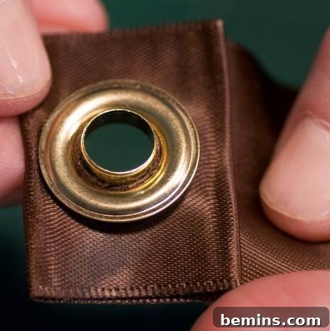 Grommet pieces aligned for setting