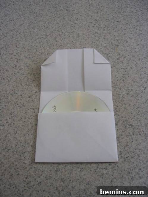 The top corners of the paper are being dog-eared.