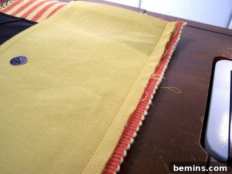 Sewing the flap onto the back panel