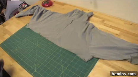 From Turtleneck to Trendy: DIY Shrug Transformation 5 Cut the arms into three-quarter sleeves
