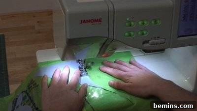 DIY Rain Gear: Transforming a Shower Curtain into a Poncho 12 Sewing machine in action