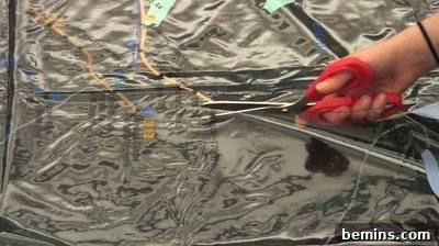 DIY Rain Gear: Transforming a Shower Curtain into a Poncho 5 Cutting a shower curtain
