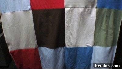 Rectangular patches of various solid colors sewn together like a quilt. T-Shirt Quilt.