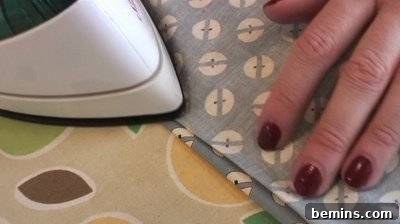 Performing a blind hem on a sewing machine.