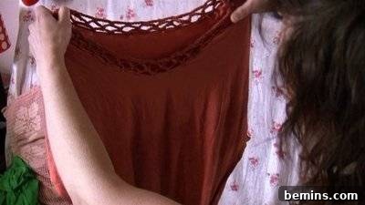 Person Holding Brown Blouse