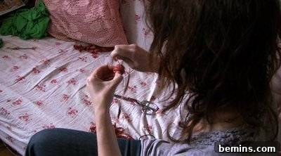 Woman Working at Crocheting