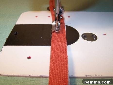 Back in Style: Mid-Century Modern Cushion Makeover 7 Sewing the welt cord into the bias fabric strip.
