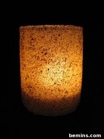 DIY Sanded Light Bulb 8 Tall circular jar with light inside with sanded surface.