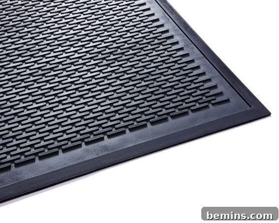 Image of the grey rubber welcome mat used as a base.