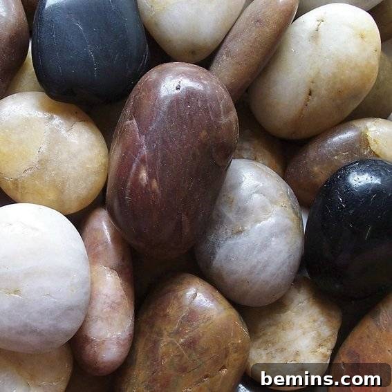 Close-up of colorful polished river rocks.