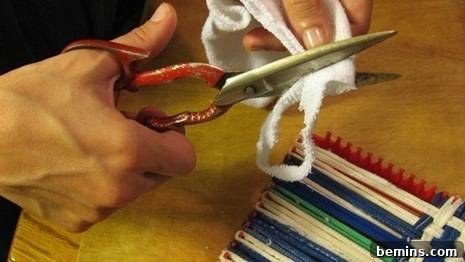 Cutting fabric with scissors