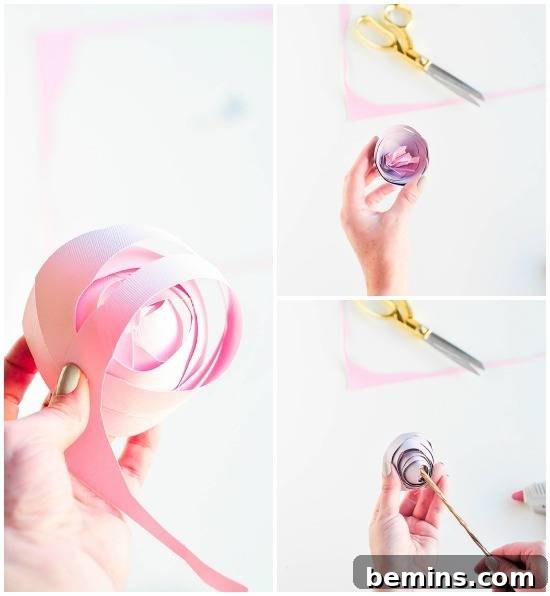 Attaching the stem to the paper rose and displaying the finished product.