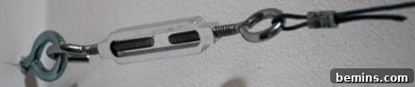 Attaching Wire to Screw Eye with Splicing Sleeves