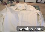 SHOWING A WHITE SHIRT.