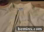 A white shirt lying on the surface.