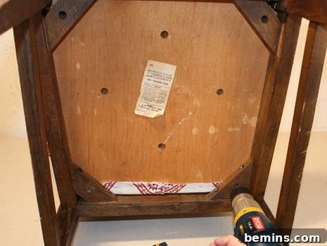 Reattaching the seat to the frame