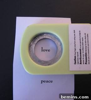 Cutting out inspirational words for stones