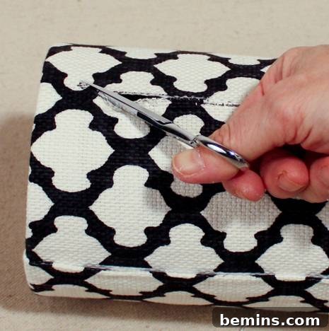 Repurpose and Organize: An Oatmeal Container Ribbon Dispenser 14 Cutting the Ribbon Slot Fabric