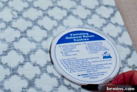 Repurpose and Organize: An Oatmeal Container Ribbon Dispenser 16 Tracing the Top of the Container