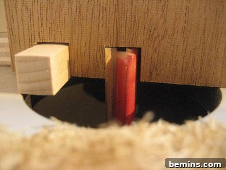 How to Craft Your Own Box Joint Jig at Home 8 The indexing pin securely glued 3/8' to the left of the slot, providing precise spacing for creating interlocking fingers.