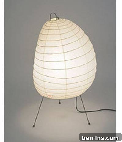 A light has a black wire hanging from it.