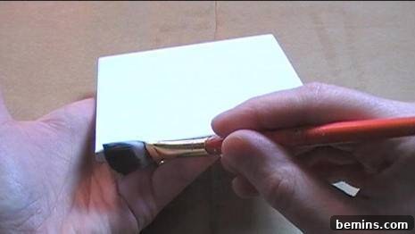 Applying Mod Podge to Ceramic Tile