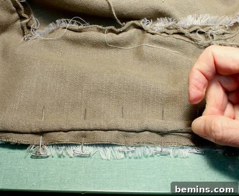 Close-up of the pinned seam showing the stitching path